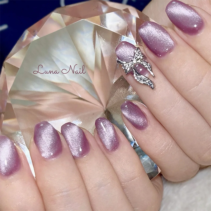 ⑤大人っぽい色味に可愛いさを♡くすみパープル×リボンネイル