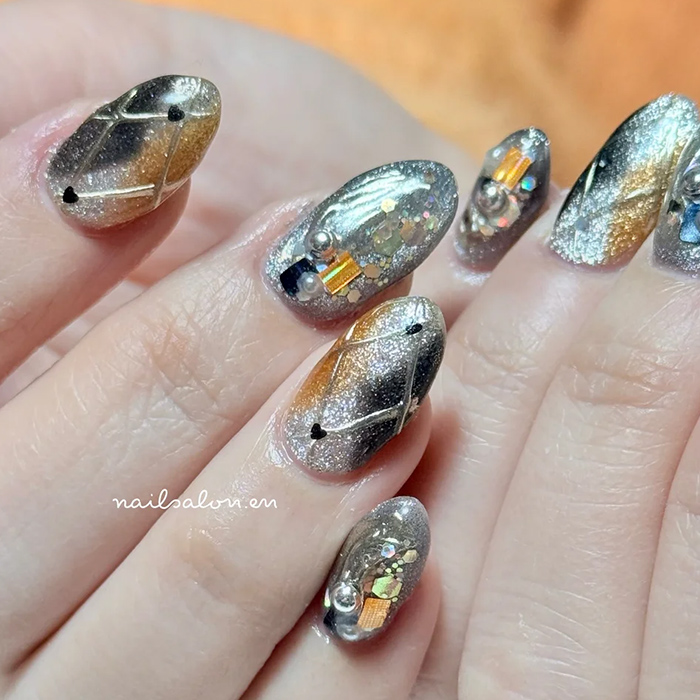 ④洗練カラーが主役♪シルバーベースのアーガイルネイル